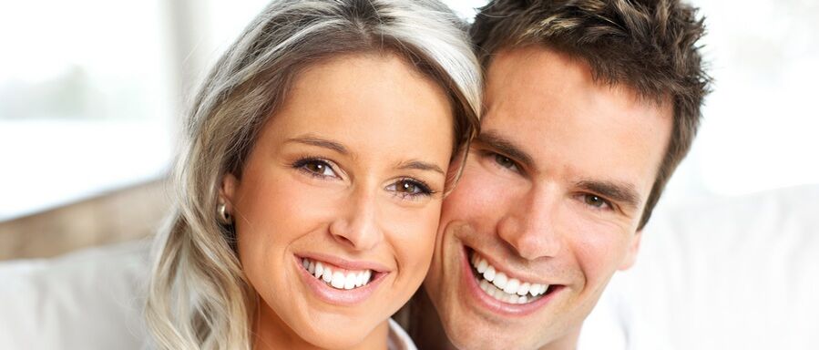 a woman and a man with good eyesight after his recovery